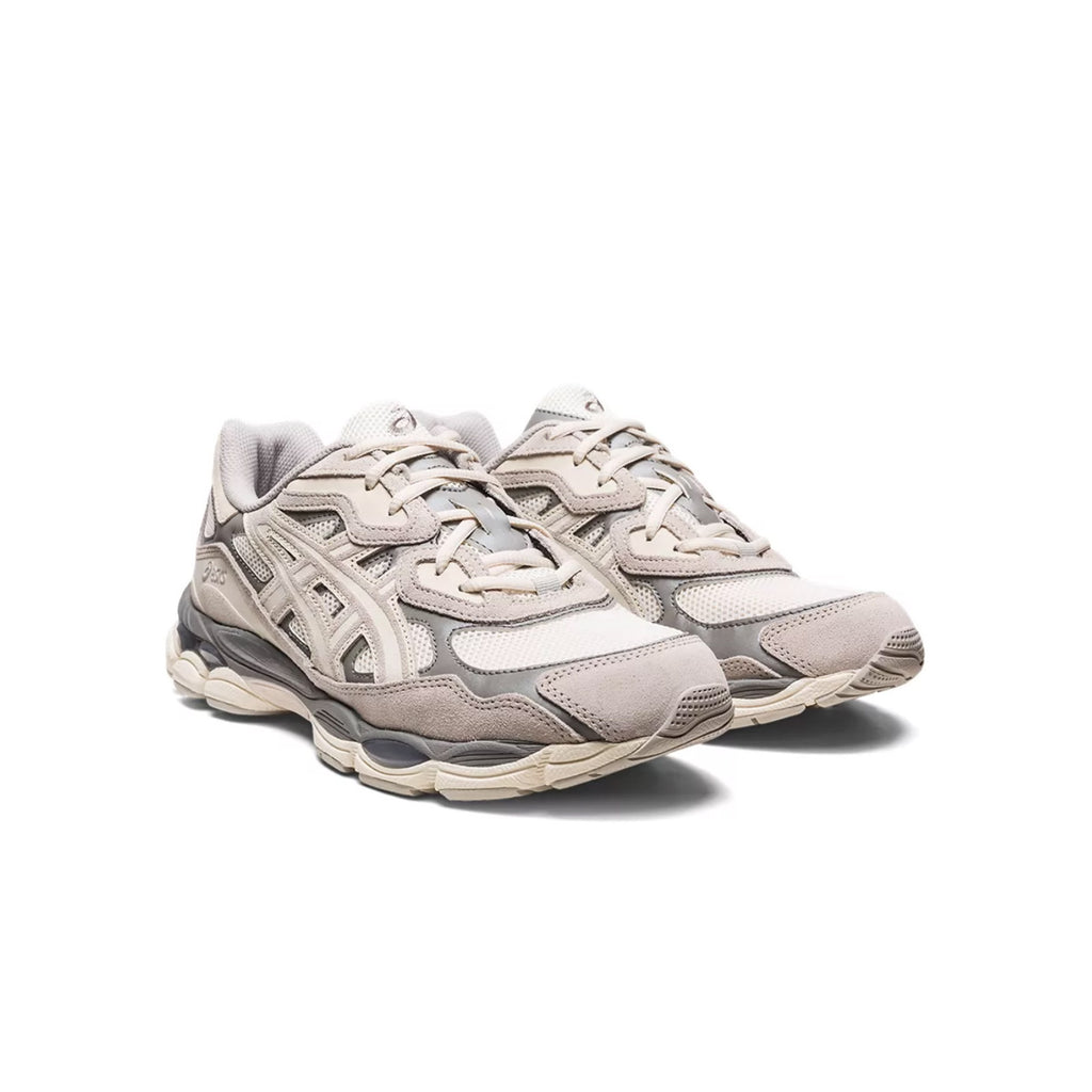 Side view of Asics Gel-NYC sneakers in cream and oyster grey with retro design and Gel cushioning