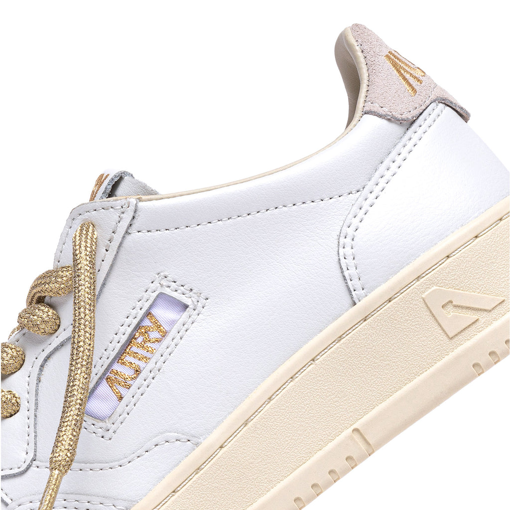 sneakers autry medalist blanches et dorées femmes vue de détails