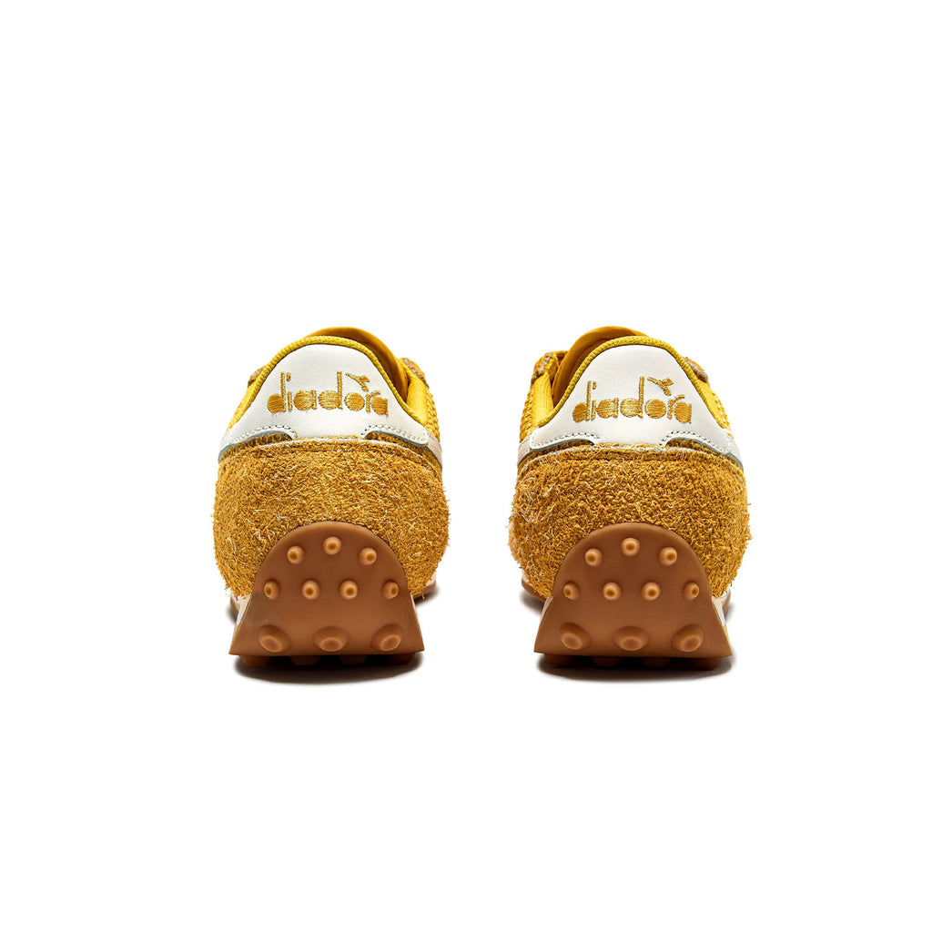  Rear view of Diadora Rally Yellow sneakers showing sculpted heel and Y2K-inspired design