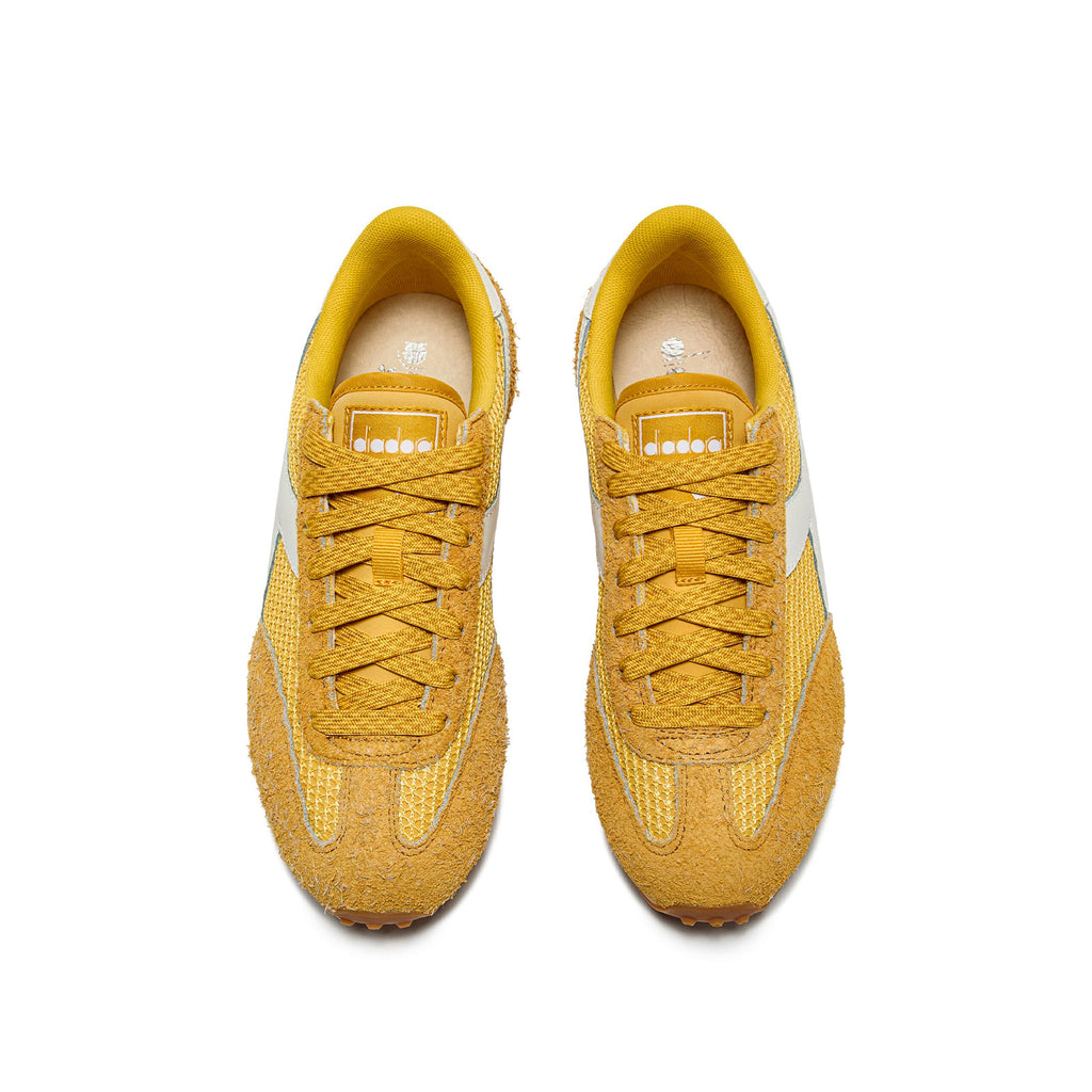  Top-down view of Diadora Rally Yellow sneakers featuring breathable mesh upper and retro aesthetic