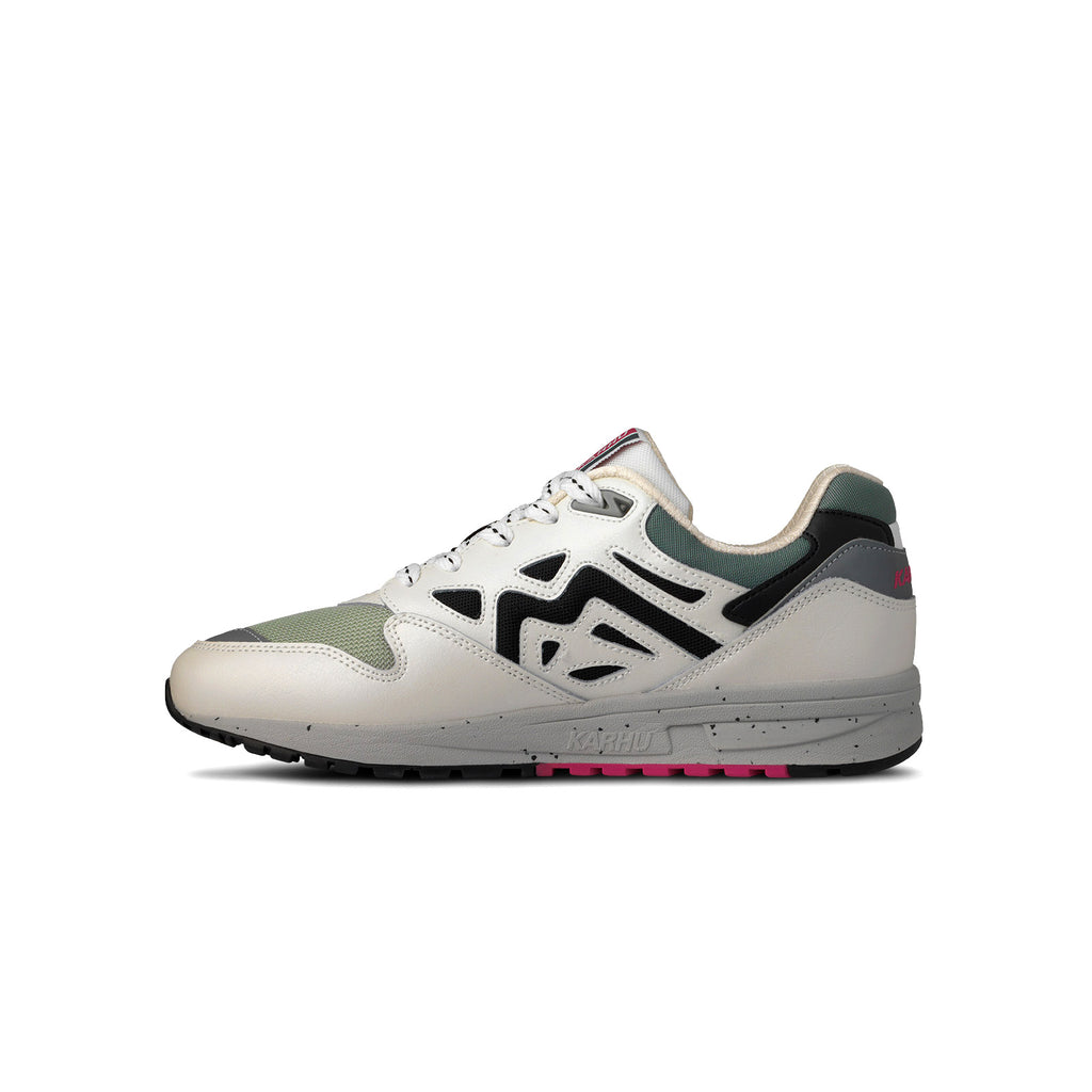 Medial side of Karhu Legacy 96 white and black sneaker