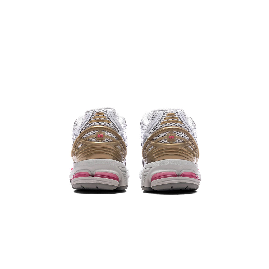 New Balance 1906R RCH side view – metallic silver and dragon berry running sneakers with ABZORB cushioning