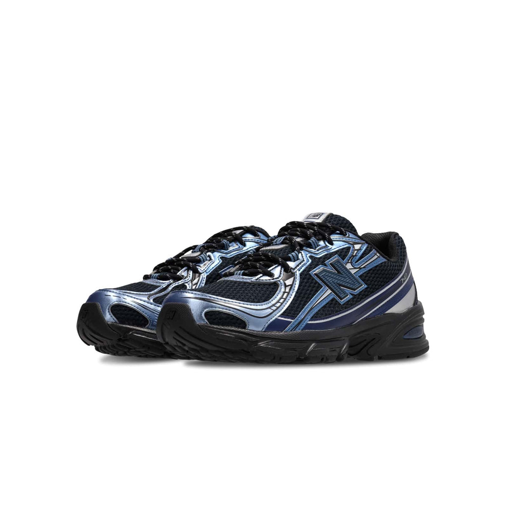 Baskets New Balance 740 bleu pour hommes vue de trois quarts