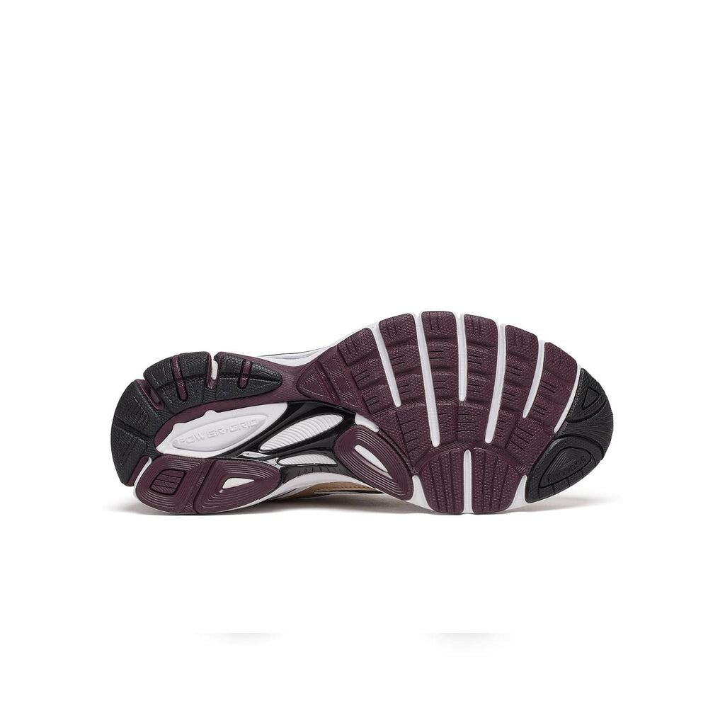 Detail of sole and cushioning on Saucony ProGrid Guide 7 white bronze running shoe