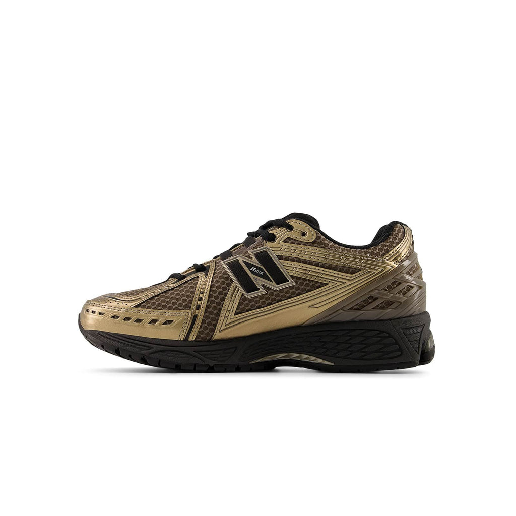 sneakers new balance 1906 bronze dorées vues de coté