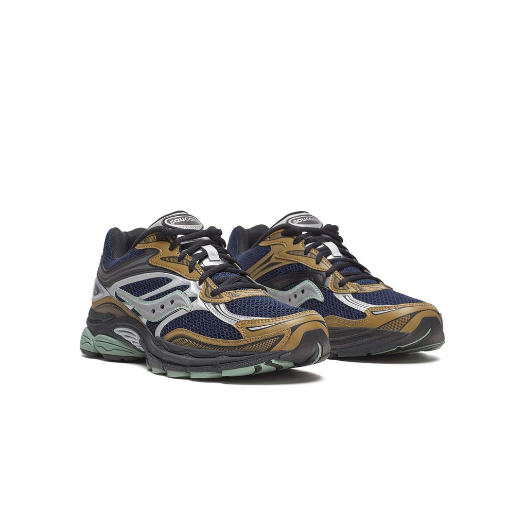 sneakers saucony progrid omni 9 bleu et brunes vues de trois quarts